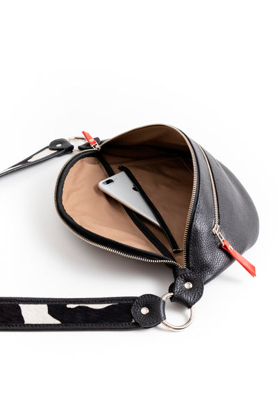 Riñonera Filippa <br/> Negra con Vaca