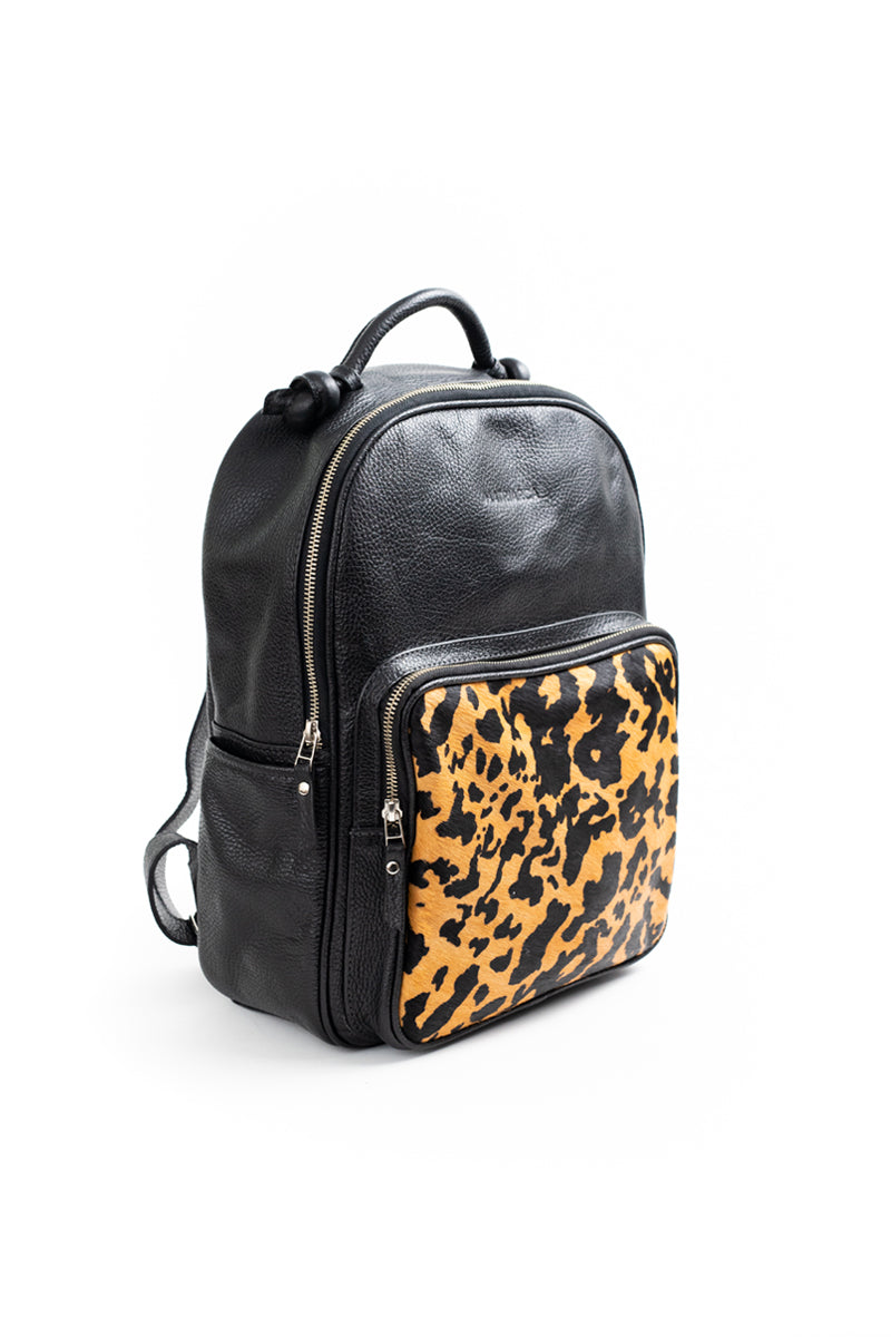 Mochila Olivia <br/>Negra con pelo Manchas