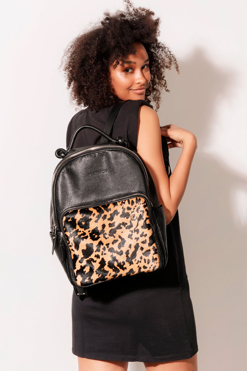 Mochila Olivia <br/>Negra con pelo Manchas